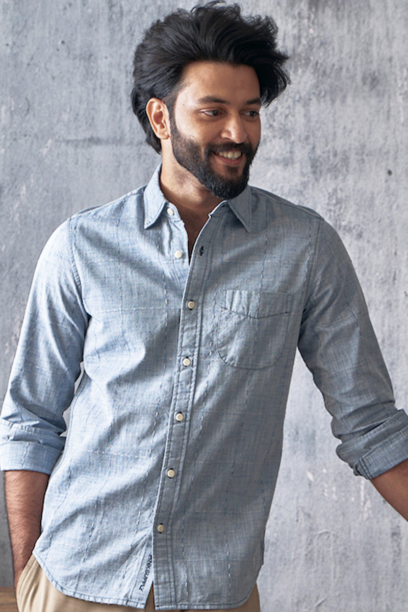 Chambray checks with woven designs.