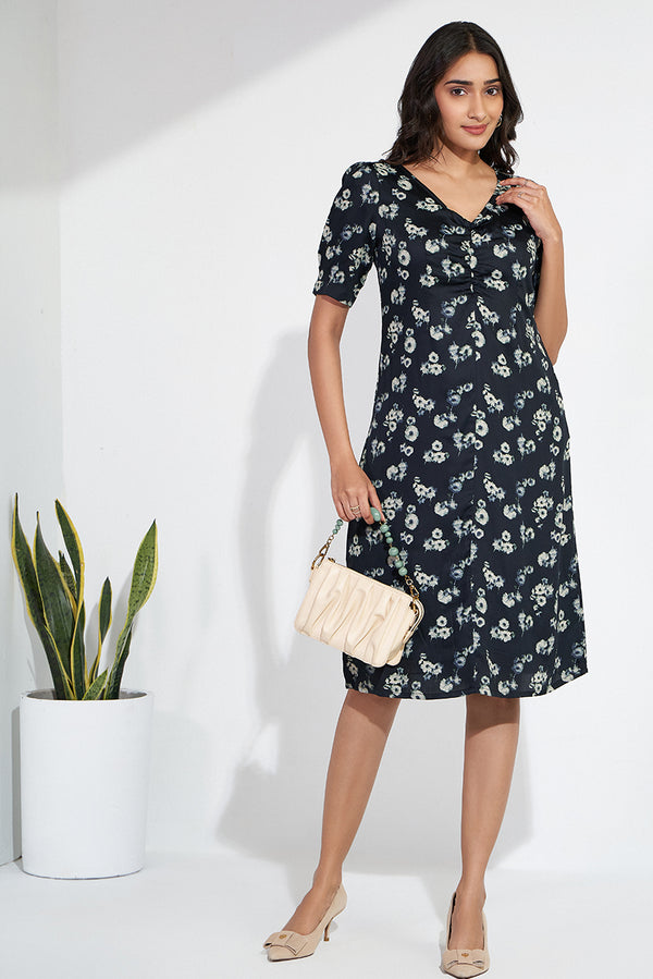 Black printed evening dress in sustainable fabric with sleeves