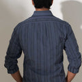 back view if grey striped woven cotton shirt for men