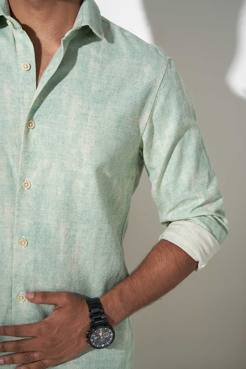button and collar view of moss green printed cotton shirt