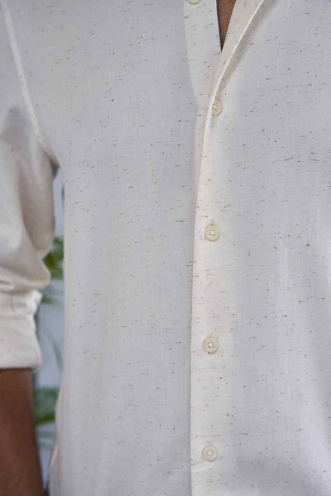 ivory shirt with coffee brown sparkles close view