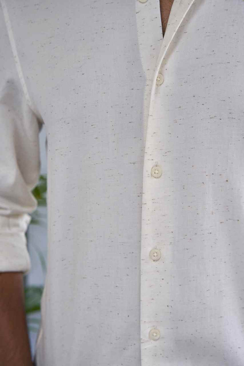 ivory shirt with coffee brown sparkles close view