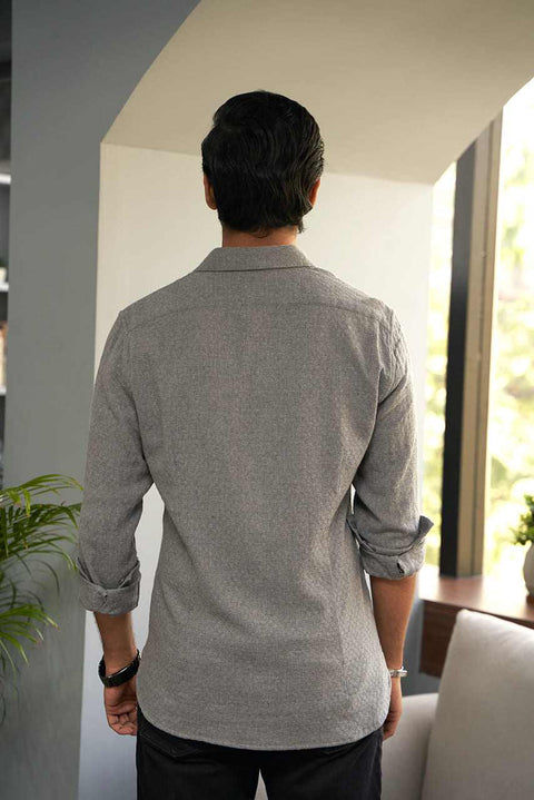 man showing back style of premium grey dobby shirt