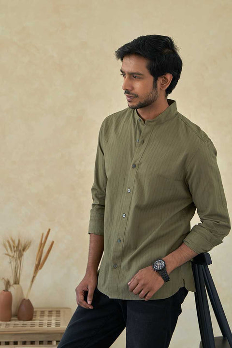 man wearing graceful green chinese collar cotton shirt