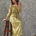 Long Dress With Square Neck Model Sitting View